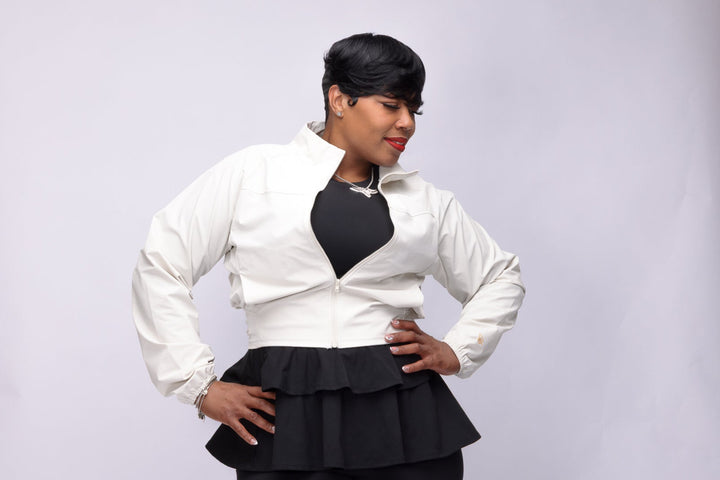 Stylish woman wearing a cream Pooh Wear Jacket designed by Avanda