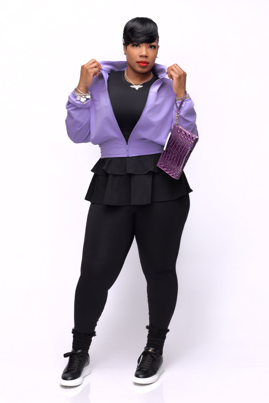 Woman wearing lavender Pooh Wear jacket. 